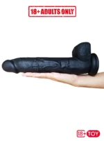 Big black dildo lying on hand – realistic dildo pic showing true size and girth